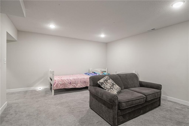 bedroom featuring light carpet