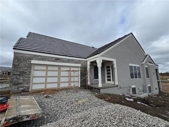 view of front of property featuring a garage