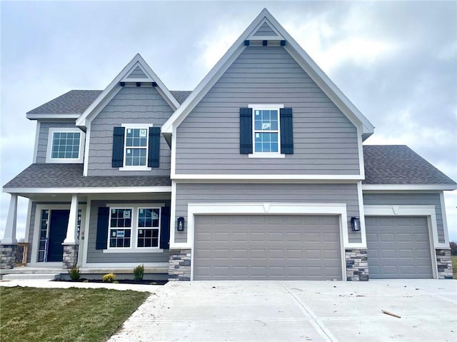 craftsman inspired home with a garage