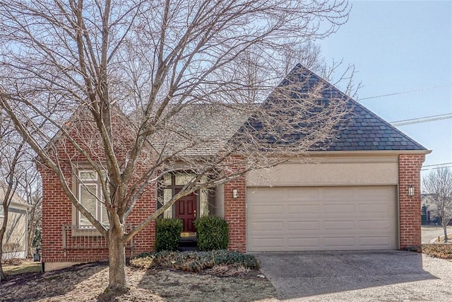 view of front of property with a garage