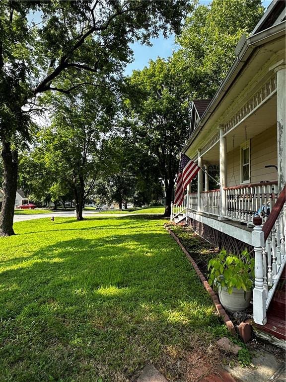 view of yard with a porch