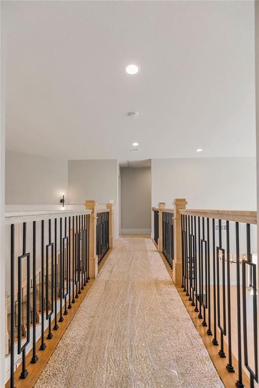 hallway featuring recessed lighting