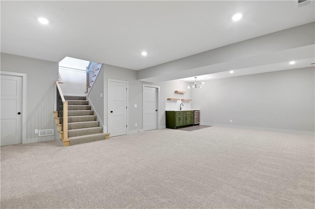 24940 W 98th Pl, Lenexa, KS 66227 - finished below grade area with stairway, recessed lighting, and carpet flooring