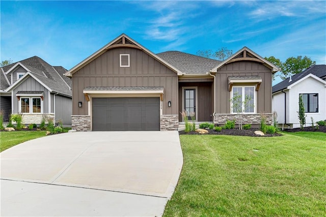 24940 W 98th Pl, Lenexa, KS 66227 - craftsman inspired home with board and batten siding, stone siding, a garage, and a front lawn