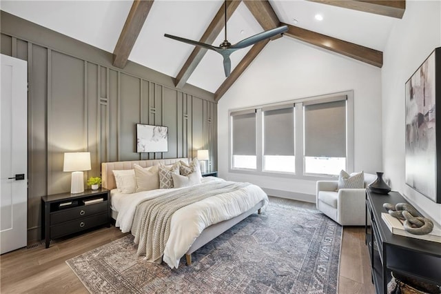 13707 Pembroke Ln, Leawood, KS 66224 - bedroom with light wood-type flooring, beam ceiling, high vaulted ceiling, and ceiling fan