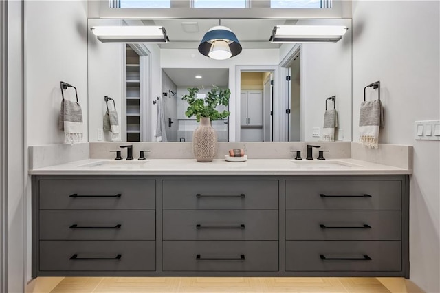 13707 Pembroke Ln, Leawood, KS 66224 - full bathroom featuring a sink and double vanity