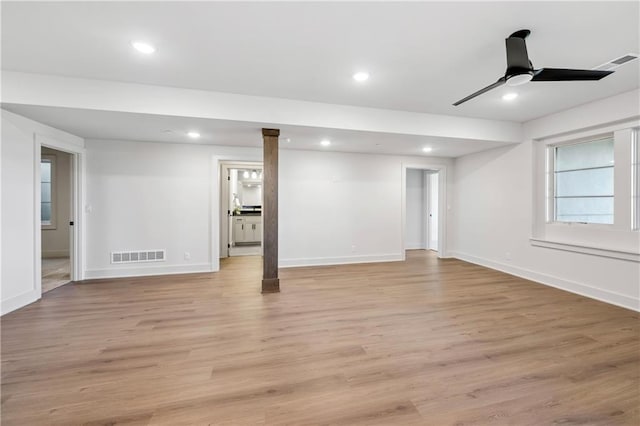 13707 Pembroke Ln, Leawood, KS 66224 - below grade area featuring recessed lighting, light wood-style floors, visible vents, and baseboards