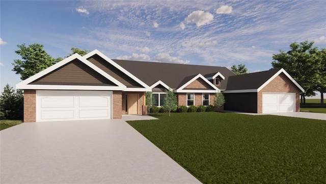 view of front of home with a garage and a front lawn