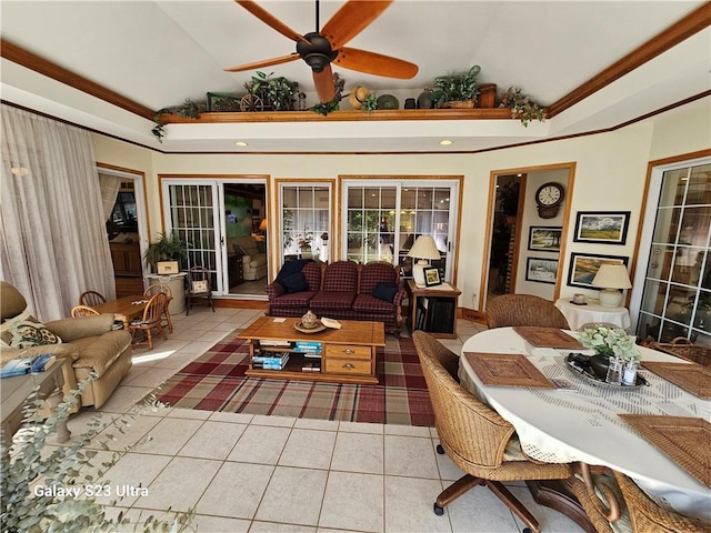 sunroom featuring lofted ceiling and ceiling fan