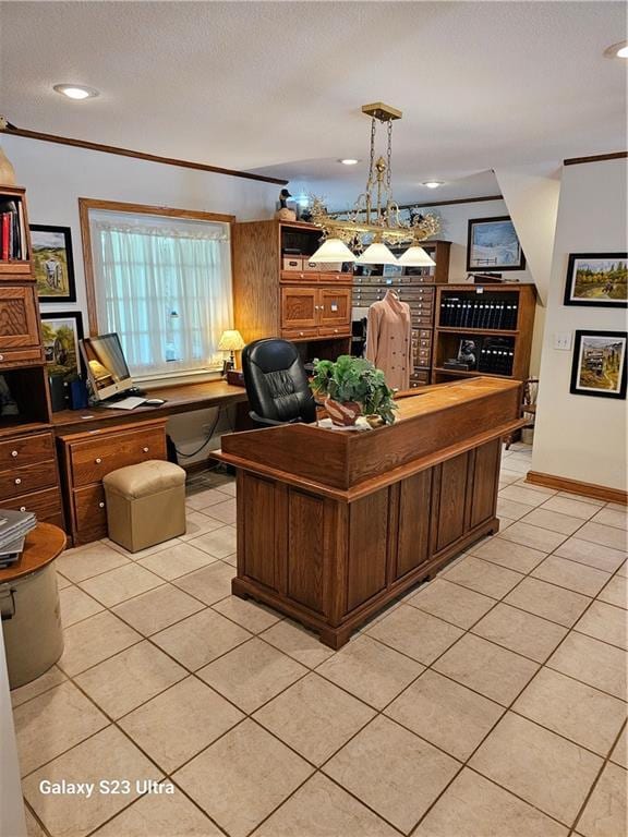 office with light tile patterned flooring, ornamental molding, and a textured ceiling