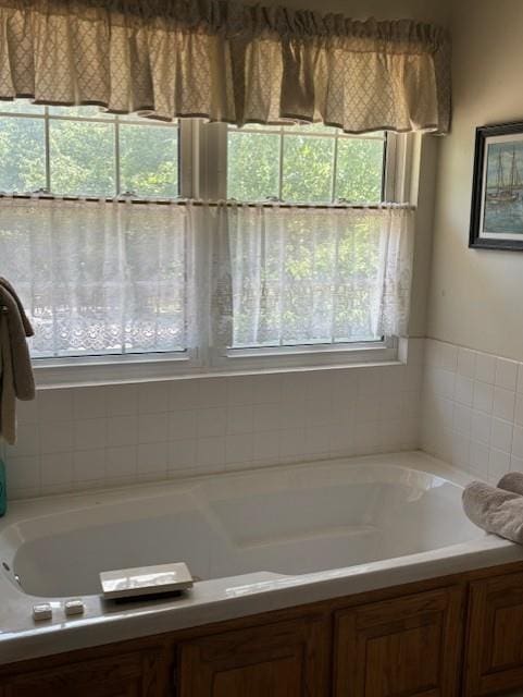 bathroom with a washtub