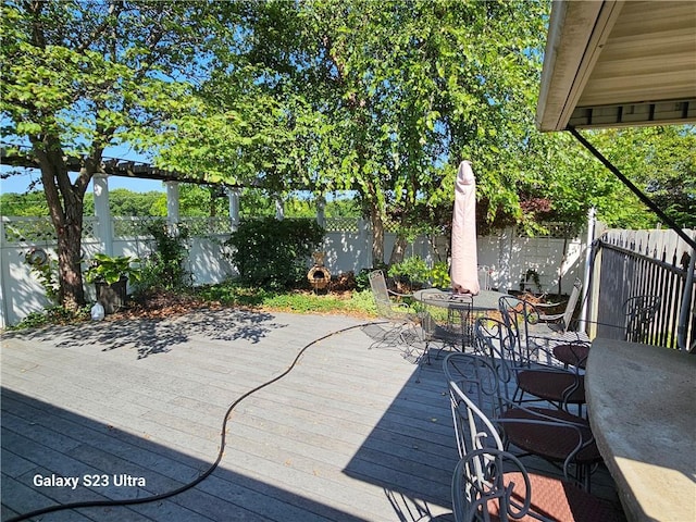 24450 171st St, Leavenworth, KS 66048 - deck featuring a fenced backyard and outdoor dining area