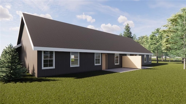 rear view of house featuring a patio and a yard