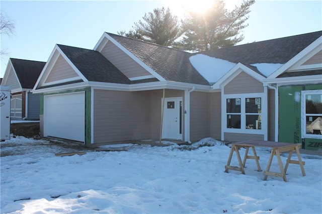 view of front of home with a garage
