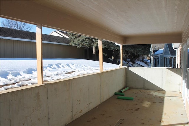 view of snow covered patio