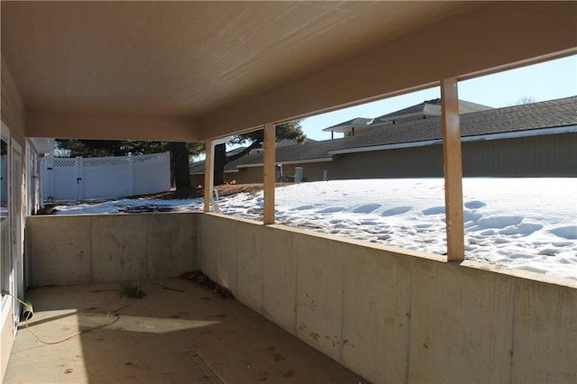 view of snow covered patio