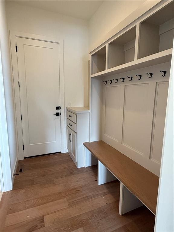 mudroom with light hardwood / wood-style flooring