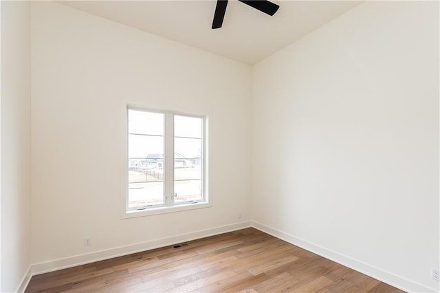 unfurnished room featuring ceiling fan and light hardwood / wood-style floors