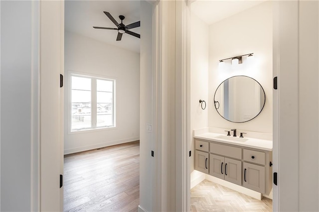 bathroom featuring vanity and ceiling fan