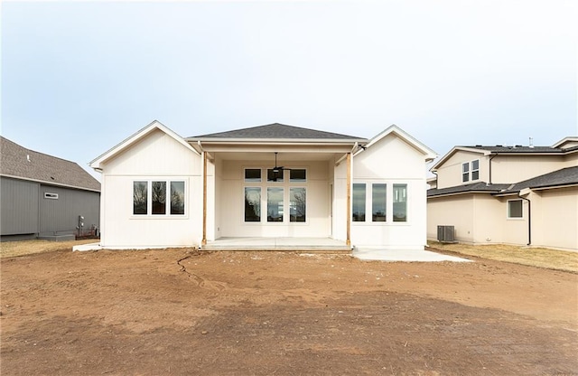 back of property featuring cooling unit, ceiling fan, and a patio area