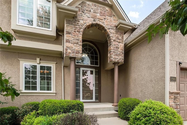 property entrance with a garage