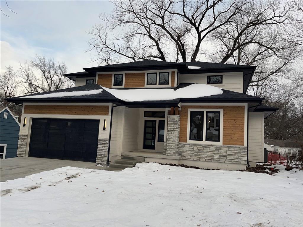 prairie-style house featuring a garage