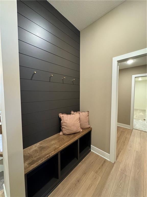 16700 NW 124th St, Platte City, MO 64079 - mudroom featuring a textured ceiling and light wood-type flooring