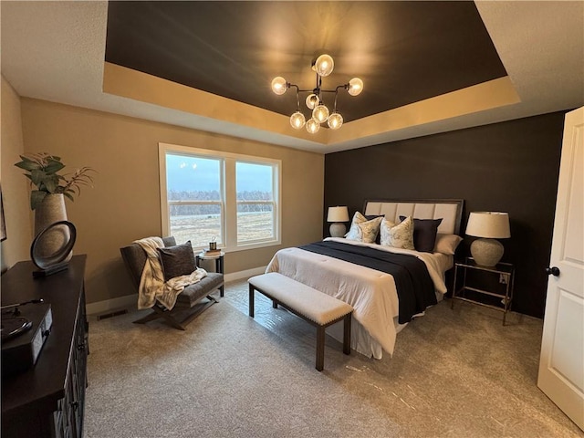 16700 NW 124th St, Platte City, MO 64079 - carpeted bedroom with a notable chandelier, a raised ceiling, and a water view