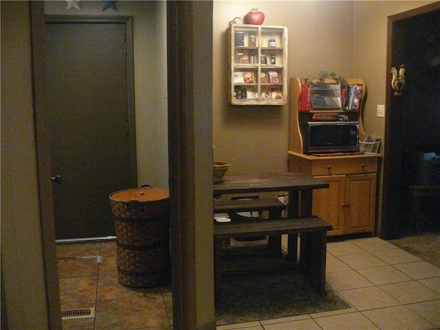 view of tiled dining area