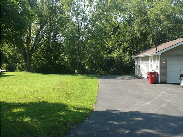 view of yard with a garage