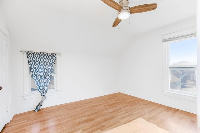 spare room featuring light wood-type flooring and ceiling fan