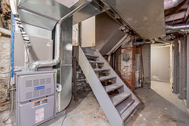 utility room with water heater