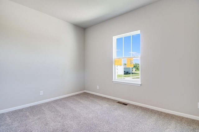 view of carpeted spare room