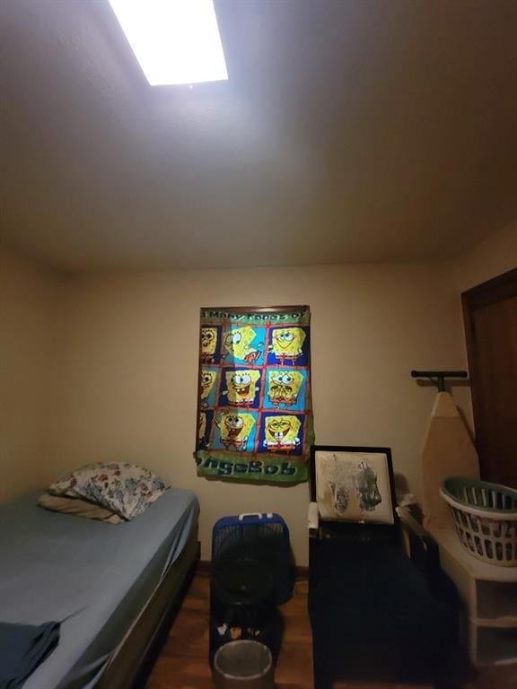 bedroom featuring hardwood / wood-style floors