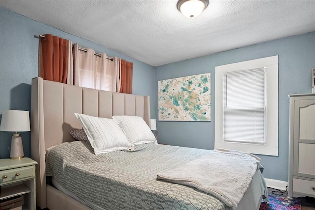 bedroom with a textured ceiling