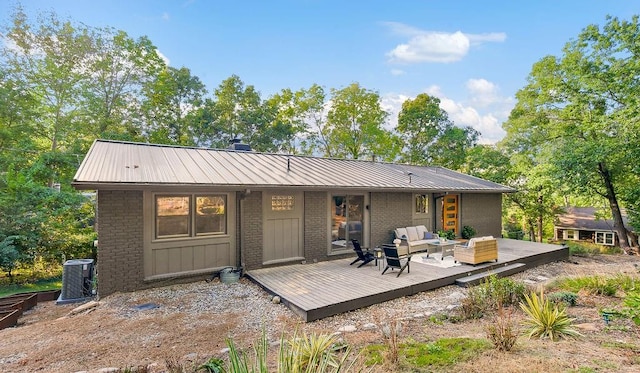 back of house featuring an outdoor hangout area, cooling unit, and a deck