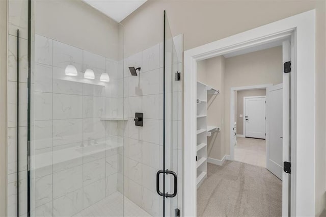 bathroom featuring an enclosed shower