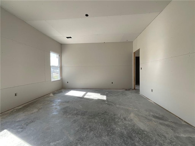 empty room with concrete floors