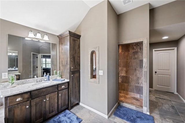 9614 NE 97th St, Kansas City, MO 64157 - bathroom with visible vents, baseboards, a walk in shower, vanity, and vaulted ceiling