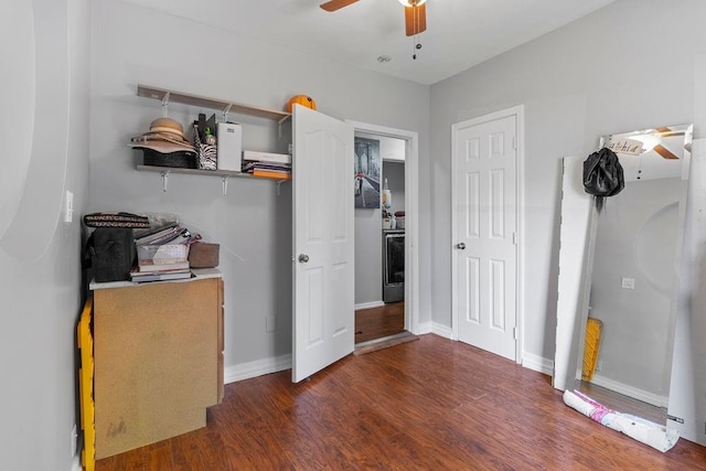 bedroom with dark wood-type flooring, baseboards, and a ceiling fan