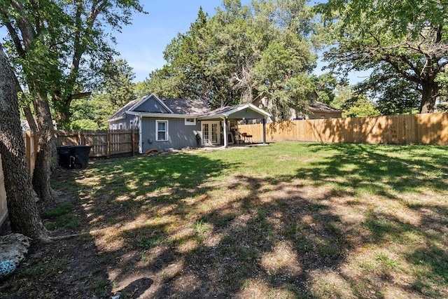 view of yard featuring a fenced backyard