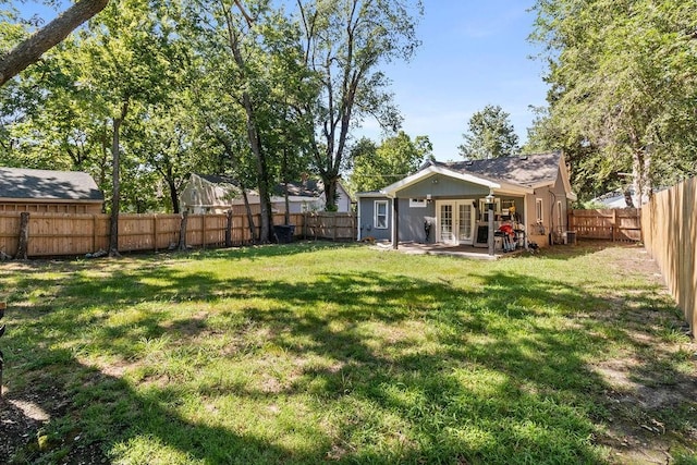 view of yard featuring a patio and a fenced backyard