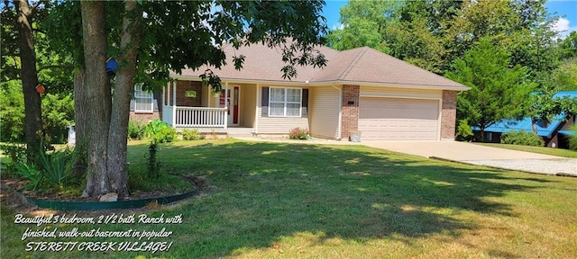 single story home featuring a garage, covered porch, and a front yard