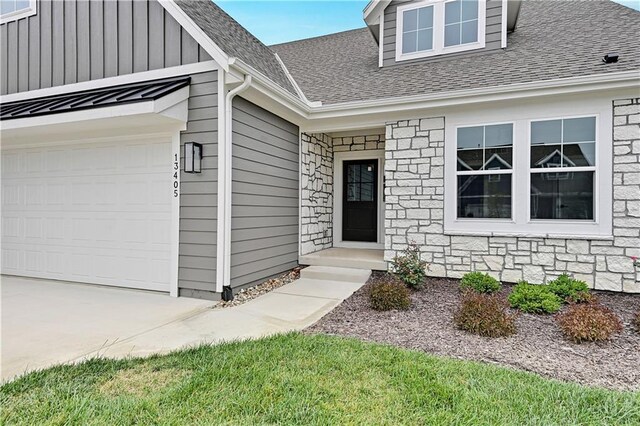 entrance to property featuring a garage