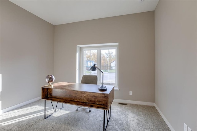 view of carpeted office space