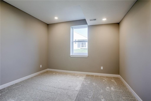 empty room featuring carpet floors