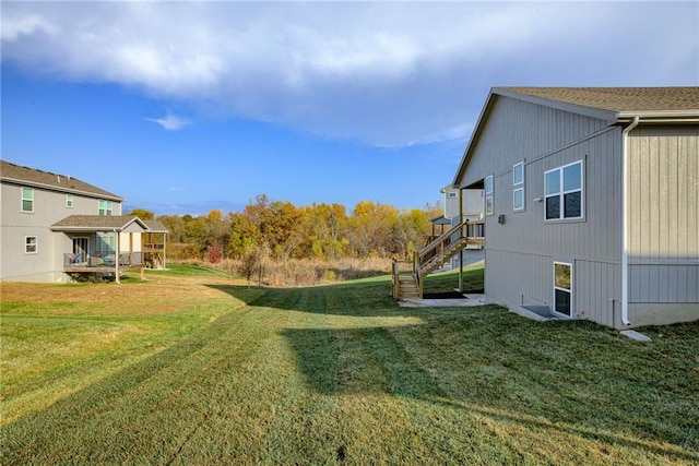 view of yard featuring a deck