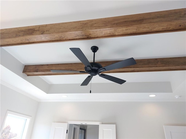 details with ceiling fan, crown molding, and beamed ceiling