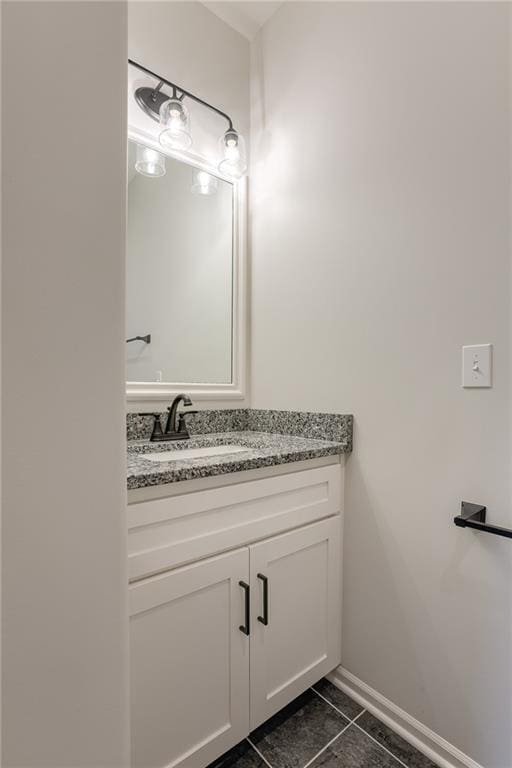 bathroom featuring tile patterned floors and vanity