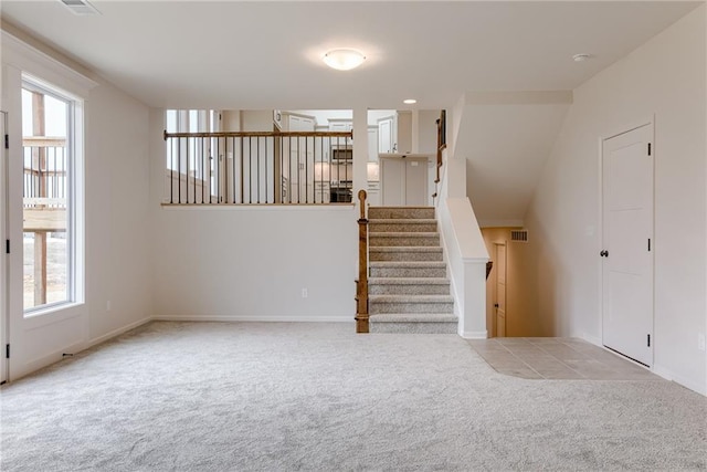 interior space featuring carpet flooring